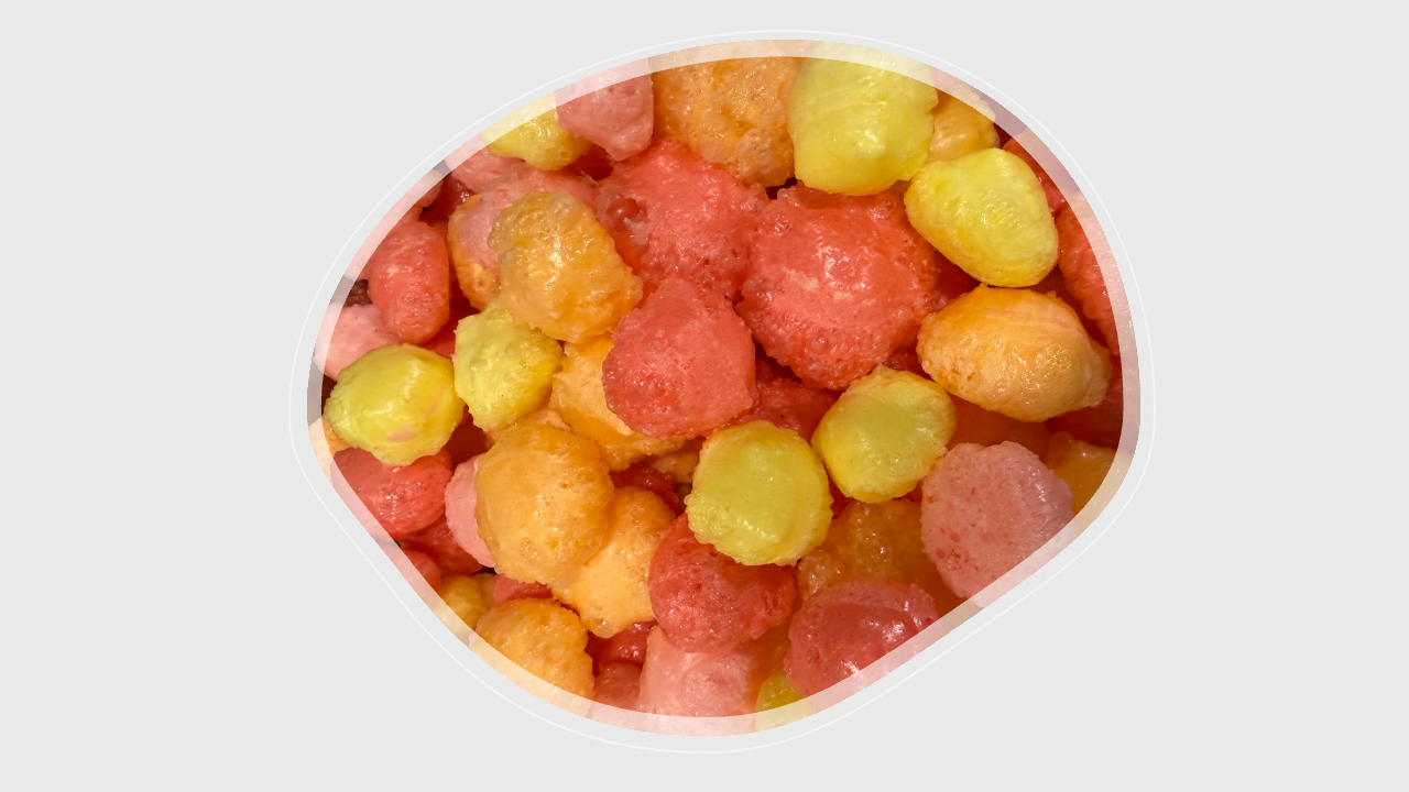 Close-up of crispy, airy freeze-dried Starburst showing vibrant colors and texture